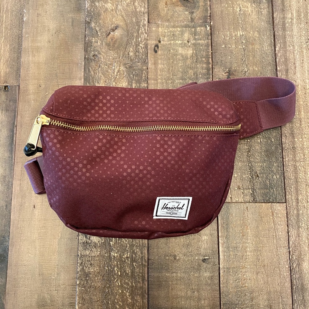 Burgundy Herschel 15 waist pack. Brand new without tags.